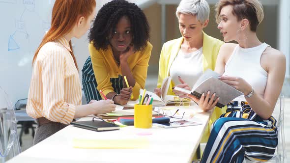 Charming Stylish Women Finding a Conclusion To a Specific Problem