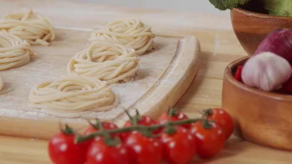 Freshly Made Pasta Nests on Kitchen Table