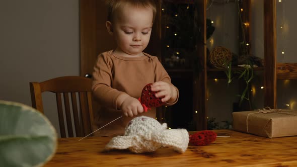 Toddler Boy with Valentine's Day Decoration at Home