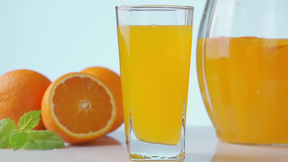 Glass with Summer Healthy Lemonade, Cocktail of with Orange and Ice