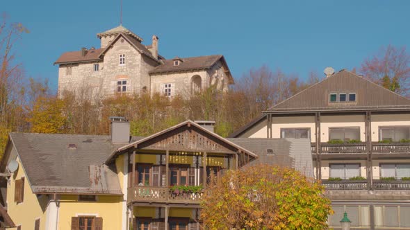 Traunkirchen town center with houses and pan to Odinstein