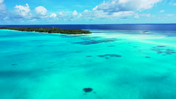 Aerial top view landscape of relaxing island beach break by transparent ocean with clean sandy backg