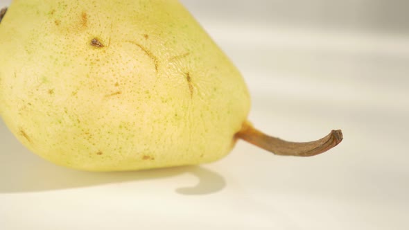 Pear fruit on white background  4K 2160p UHD panning footage - Beautiful pears on white background  