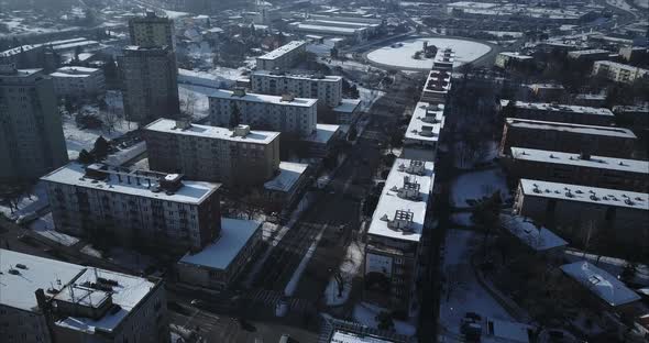 Flying above Sturova street in Nitra City towards roundabout, Winter, Aerial shot, Slovakia