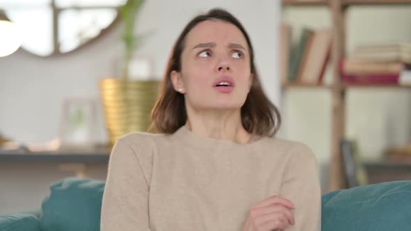 Portrait of Young Woman Feeling Scared at Home