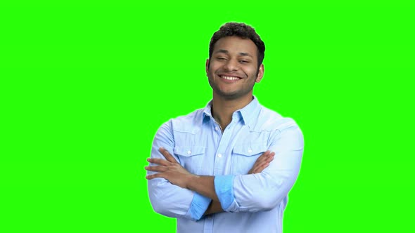 Young Man Crossed Arms on Green Screen
