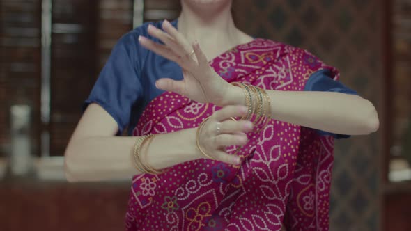 Female Hands in Bracelets Dancing in Indian Style