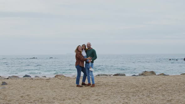 Portrait of Parents With Their Small Girl