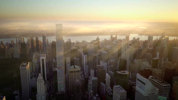 Helicopter Aerial Shot of Modern Skyscraper Buildings in Urban City Metropolis