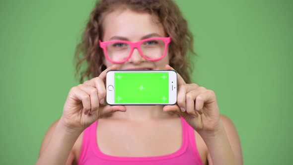 Young Happy Beautiful Nerd Woman Showing Phone