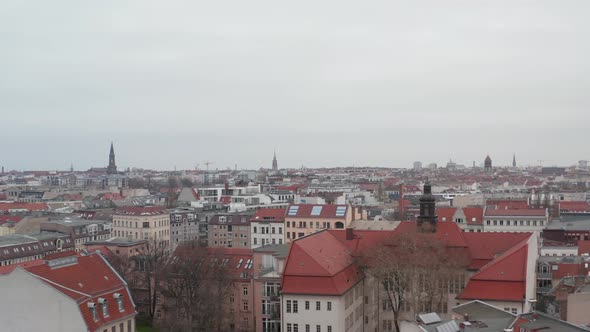 AERIAL: Slow Flight Over Empty Berlin Neighbourhood with Rooftops During Coronavirus COVID 19 on