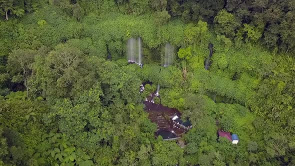 Waterfall in the middle of the jungleBreathtaking aerial view flight panorama overview drone footag