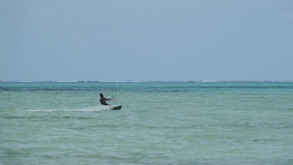 Kitesurfing on the Tropical Beach in Turquoise Sea Water Paje Zanzibar