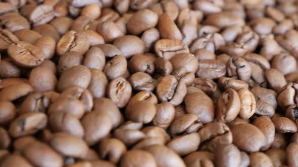 Dolly shoot of coffee beans arranged background 4K 3840X2160 UltraHD footage - Slow dolly shoot of c