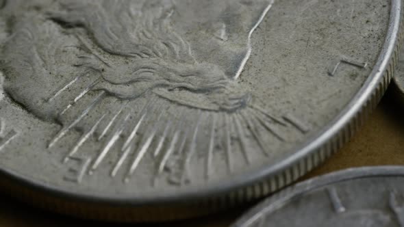 Rotating stock footage shot of antique American coins - MONEY 0123