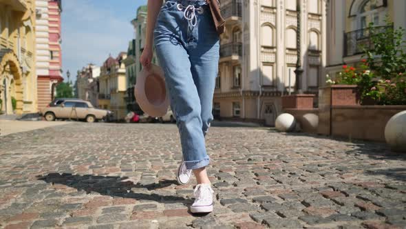 Beautiful Young Woman Tourist Pleasant Walk in the City Center