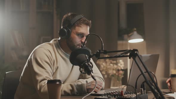 Man Hosting Online Radio Show From Home