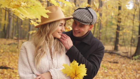 Lovely Couple Posing in Autumn Forest, Lovers Walking in Park.