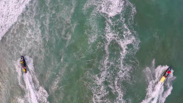 Aerial view of lifeguard surf rescue jet ski personal watercraft in Hawaii