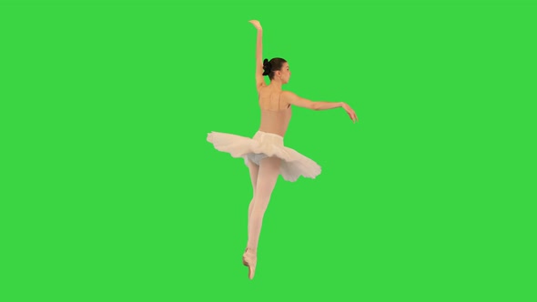 Ballerina Makes Spins on Her Tiptoes and Runs Away on a Green Screen Chroma Key
