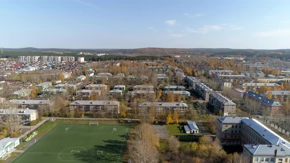 Aerial view of empty stadium in a provincial town. 68