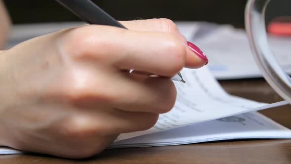 Clerk Hands with Manicure Turn Contract Form Pages