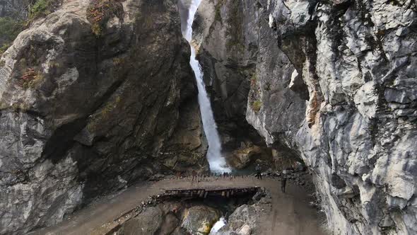 Aerial view flying backwards viewing the Chame Waterfall