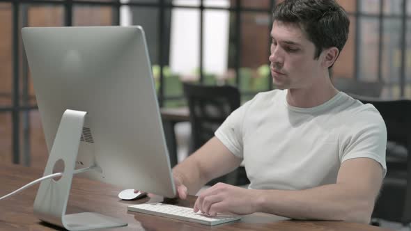 Man Working on Computer