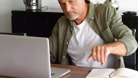 Male executive working at desk