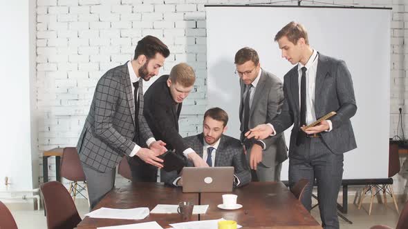 Business Team Brainstorming in Modern Executive Office