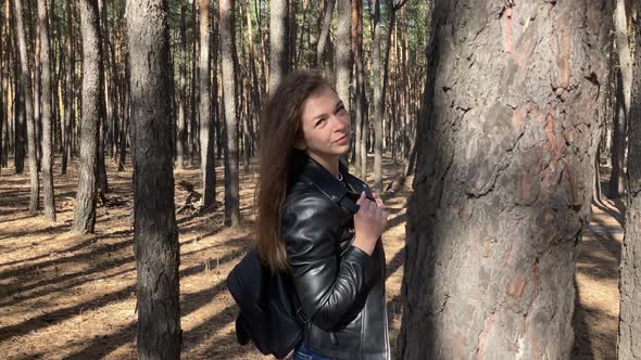 Close Up of Attractive Young Woman Posing in Wood