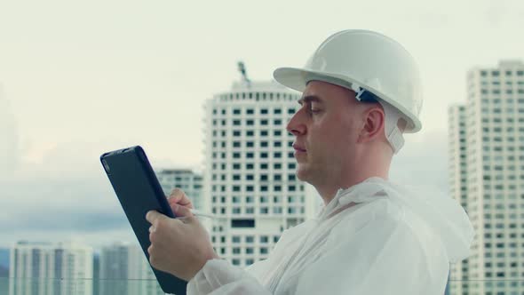 Portrait of a Professional Engineer Manager of Construction Industrial Company Wearing a Protective