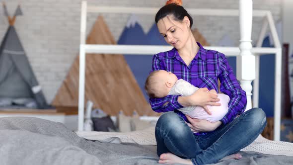 Happy Hipster Young Mother Enjoying Motherhood Lulling Little Cute Baby Full Shot