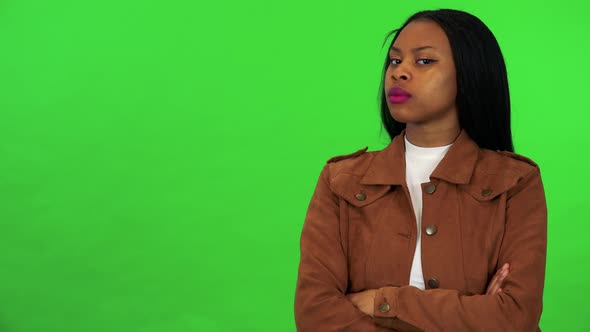 A Young Black Woman Disagrees To the Camera - Green Screen Studio