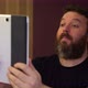 Portrait of bearded man while looking for something on the tablet - VideoHive Item for Sale