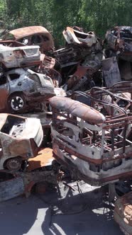 Vertical Video of a Dump of Destroyed Cars During the War in Ukraine