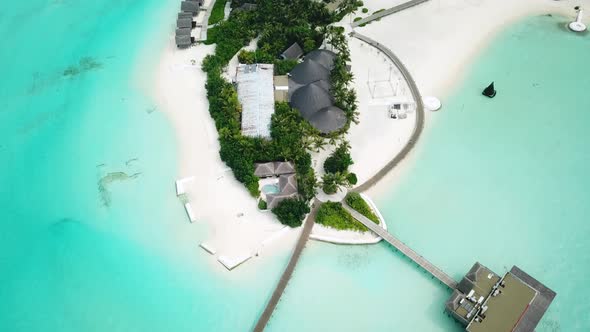 Aerial Drone View of a Beautiful Atoll or Island with a Resort in the Maldives