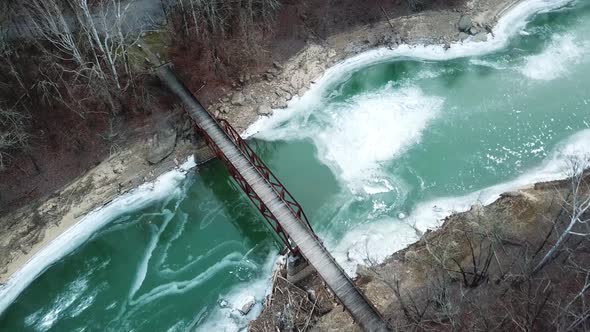 Iced Over Footbridge and River Top Down