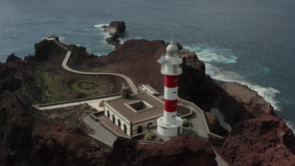 Aerial survey above the roads in Tenerife, Canary islands, lighthouse Teno