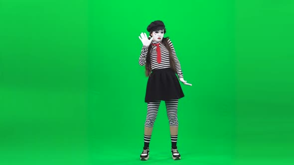 Mime Girl Is Dancing Behind an Invisible Glass