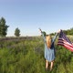 Woman  With American Flag In Her Hand - VideoHive Item for Sale