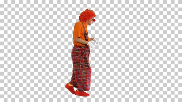 Clown in red wig walking and dancing in, Alpha Channel