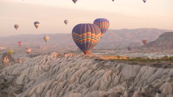 Different Colourful Hot Air Balloons with Huge Envelopes Fly