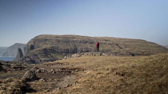 Hiker Looking At Dramatic Landscape