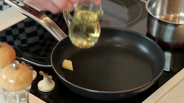 Melting Piece of Butter on a Frying Pan