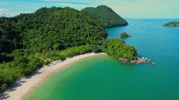 4K aerial view of the beautiful mountain coast of the tropical sea