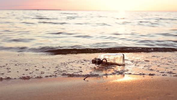 Message in the Bottle Against the Sun Setting Down