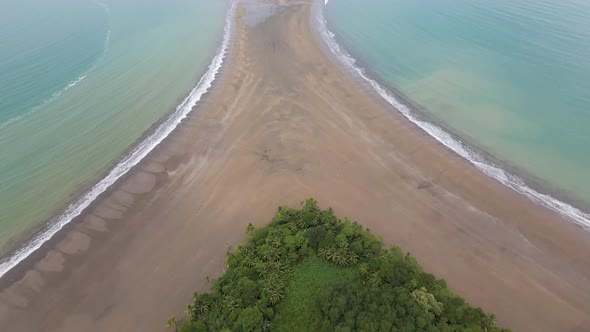 Drone shot flying over Whale Tail Beach on the coast of Costa Rica