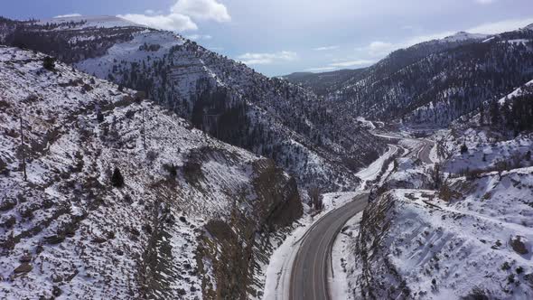 Snowy Mountains and Road in Winter