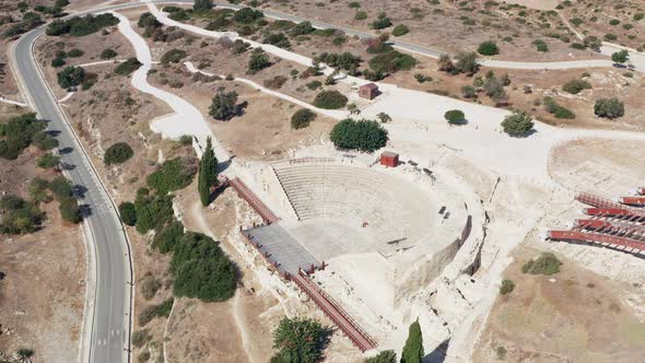 Flight of a Drone Over the Ruins of an Old Historic Ancient Amphitheater